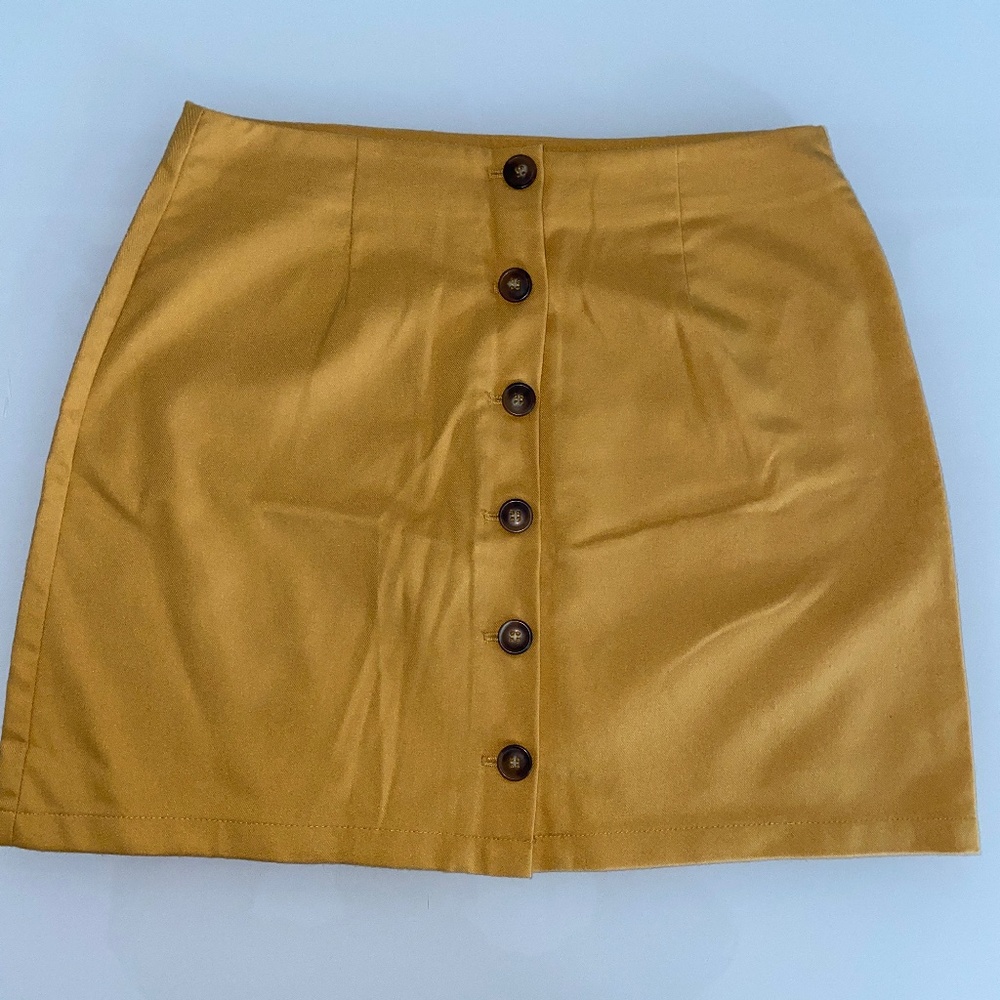 Yellow button front mini skirt